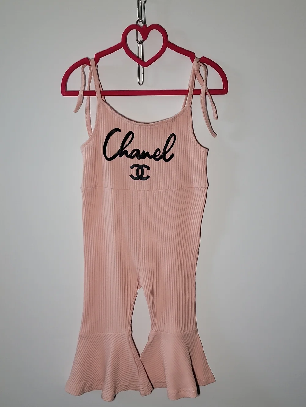 CHANEL Pale Pink Ribbed Tie-Strap Jumpsuit with Flared Hem